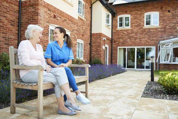 senior woman sitting on bench